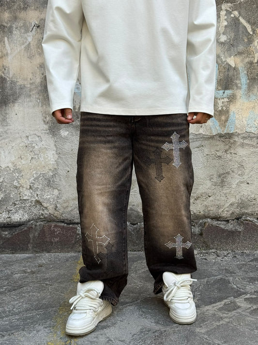 Jeans sabbiato con croce